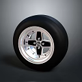 Car Tire And Wheel Rim Component With Black Rubber And Silver Alloy Design