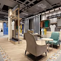 Modern Clothing Store Interior Featuring Displayed T-shirts Colorful Apparel Comfortable Chairs And Table