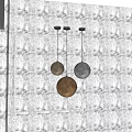 Three Spherical Moon Textured Pendant Lights In Yellow And White For Interior Decor