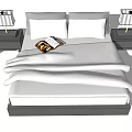 Modern Double Bed with White Bedding Bedside Tables Table Lamps and Open Book