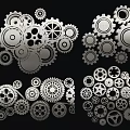 Various Metallic Gears In Different Sizes With Silver Finish On Black Background