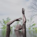 Mannequin Head Emerging From Water Surface With Raised Hands Against Green Plant Background And Ripples