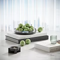 Green Pears In Black Tray With Stacked Books Glass Cup And Candle Tabletop Decorative Set
