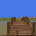 Wooden Landscape Bridge with Wooden Planks and Railings over Green Grass Under Blue Sky