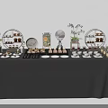 Stylish Coffee Break Area With Gray Tablecloth Desserts Cups And Decorative Flowers