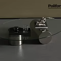 Modern Glass Coffee Table With Oval Top Metal Base And Decorative Book Glass