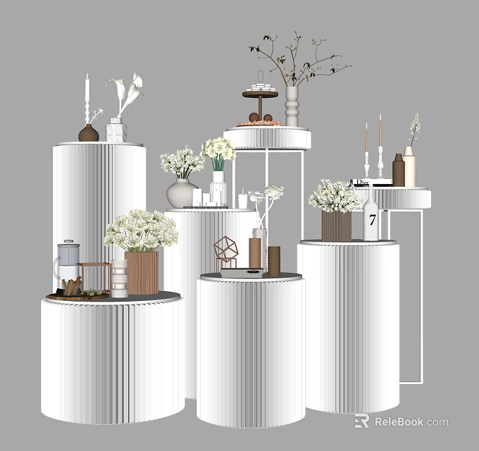 Modern Floral Display With White Cylindrical Pedestals And Decorative Arrangements 3d model 
