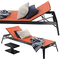 Modern Orange Cushioned Lounge Chair With Black Frame Pillows And Striped Blanket
