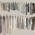 Hanging Clothes in Various Styles with Neutral Tones Neatly Arranged on Wall Hangers