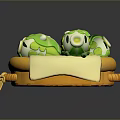 Cute Green Animal Shaped Daily Living Items Placed In Orange Basket With White Cloth