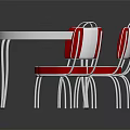 Oval Outdoor Table With White Tabletop Metal Frame And Four Red White Chairs