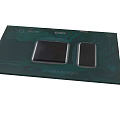 Intel Core Processor Chip With Dual Black Core Modules On Green Circuit Board