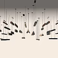 Modern Minimalist Pendant Lights with Various Shapes and Colors Hanging from Ceiling