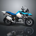 BMW Adventure Motorcycle With Blue And Silver Body Windshield Side Cases And Black Tires