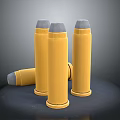 Yellow Bullets With Gray Tips Three Standing And One Lying On Dark Background