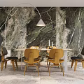 Modern Restaurant Interior With Marble Wall Dining Table Pendant Light Green Plant And Wooden Chairs