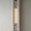 Modern Minimalist Wall Light With Long Tube And Metal Frame On White Wall