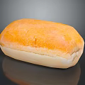 Fresh Golden Crusty Bread Loaf With Soft Interior On Black Surface