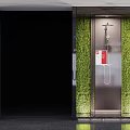 Modern Elevator Hall Interior Featuring Vertical Green Plant Wall Metal Accents Elevator Doors And Signage