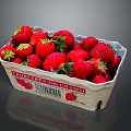 Ripe Fresh Juicy Red Strawberries with Green Leaves in Paper Carton