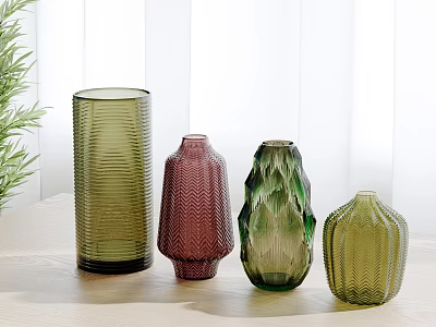 Colorful Textured Vases Arranged On Light Table With Green Plants In Bright Room 3d model