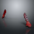 Red Decorative Protective Equipment Two Pieces With Intricate Patterns On Smooth Surface