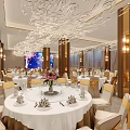 Elegant Banquet Hall Featuring White Branch Chandeliers Marble Flooring Beige Chairs And Gold Accents