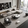 Modern Living Room Light Gray Sectional Sofa With Pillows Throw Blanket And Round Coffee Table