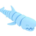 Blue Segmented Shark Toy With Cartoon Style And Sharp Teeth Design 3d model