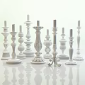 Various Stylish Candle Holders Featuring Multiple Colors And Intricate Base Designs