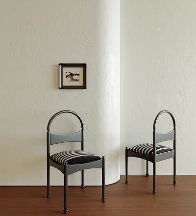 Stylish Single Chairs With Curved Backrest Black Frame And Striped Seats Against Light Wall 3d model