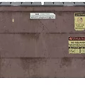 Public Facility Brown Dumpster Featuring Solid Waste Labels Hazardous Warning Signs And Wheels