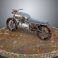 Vintage Silver Motorcycle With Rusty Tires On Round Stone Platform Surrounded By Pebbles And Moss