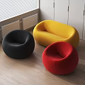 Modern Round Sofa Set With Black Yellow Red Colors In Living Room Interior