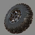 Off Road Tire With Deep Tread Pattern And Metallic Multi Spoke Wheel Rim