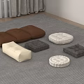 Varied Colored Square And Round Cushions Arranged On Gray Carpet
