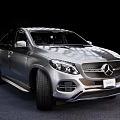 Sleek Silver SUV Coupe With Modern Aerodynamic Design Black Alloy Wheels And Streamlined Body