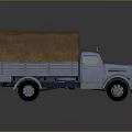 Vintage Light Blue Truck With Canvas Covered Cargo Bed And Classic Design