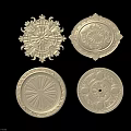 Intricate Carved Round Decorative Ornaments Featuring Detailed Floral And Geometric Patterns