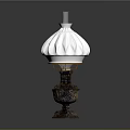 Elegant Table Lamp With White Ruffled Lampshade And Ornate Brass Base