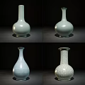 Ceramic Vases in Diverse Shapes with Light Blue Celadon Hues Smooth Surfaces and Crackle Patterns