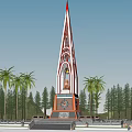 Tall Spire Tower With Decorative Base Surrounded By Palm Trees And Green Forest