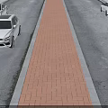 Urban Road Infrastructure Featuring Central Brick Paved Footpath And Asphalt Side Lanes