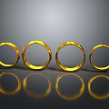 Four Shiny Gold Rings Arranged On Black Background With Reflections