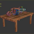Heavy Weapon With Red Circular Details Metallic Body And Brown Grip On Simple Wooden Table