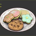 Colorful Decorated Cookies On Ceramic Plate With Sugar Flowers And Chocolate Chips