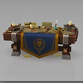 Wooden Table with Blue Banner Featuring Lion Emblem Scrolls and Candles on Top