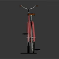 Red Vintage Bicycle With Brown Seat And Gold Rimmed Wheels On Reflective Surface