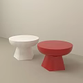 Two Round Coffee Tables White And Red With Geometric Base Design On Light Background