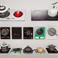 Modern Kitchen Appliances Featuring Induction Cooktops And Various Pots Pans 3d model